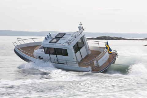 Paragon Boat driving fast on the sea